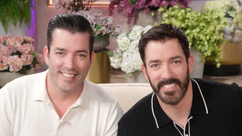 Drew and Jonathan Scott smiling