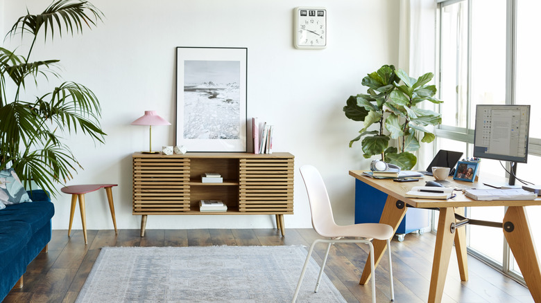 Home office with buffet table and large desk