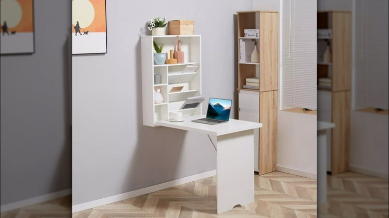 Wall-mounted fold out desk