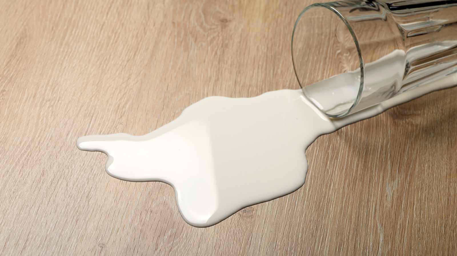 The Spilled Milk Floor Cleaning Hack You May Want To Avoid