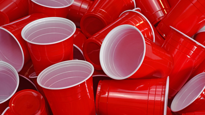 pile of red plastic cups