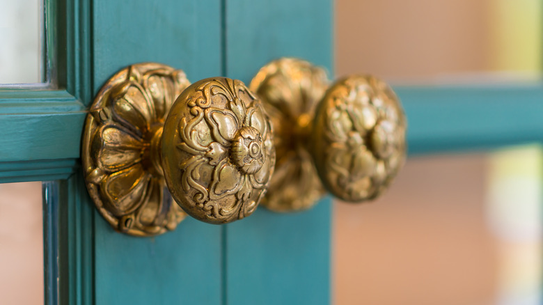 Decorative gold door knobs