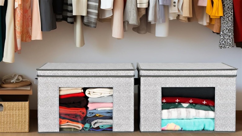 gray storage boxes in closet