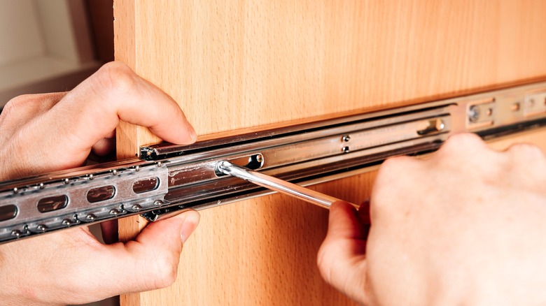 screwing drawer slides to door