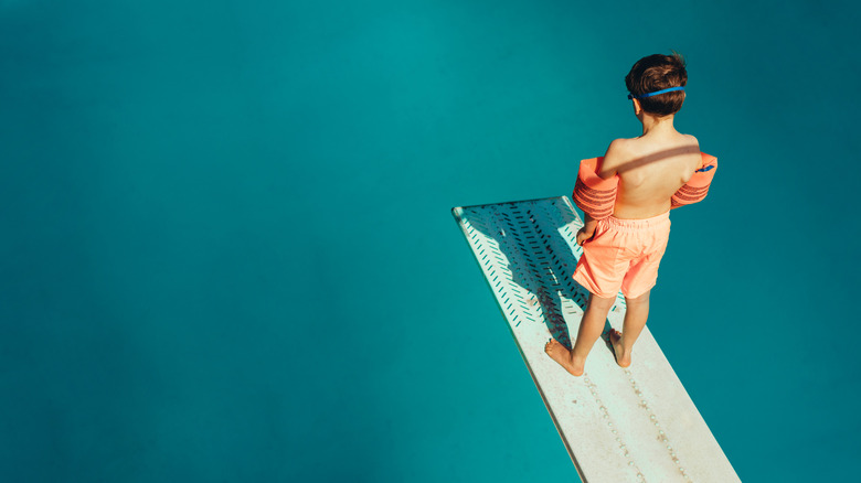 Child on diving board