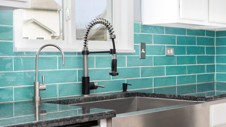 green subway tile backsplash