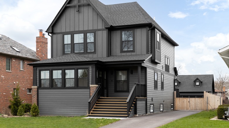 Gray house with black windows