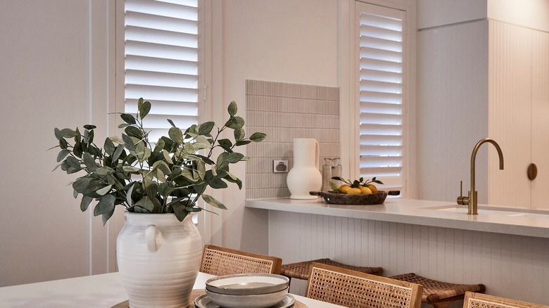 Minimalist white kitchen shutters