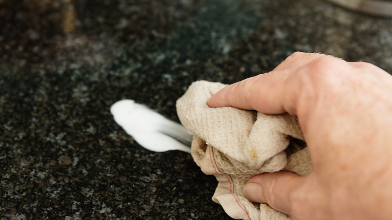 Cleaning toothpaste from countertop