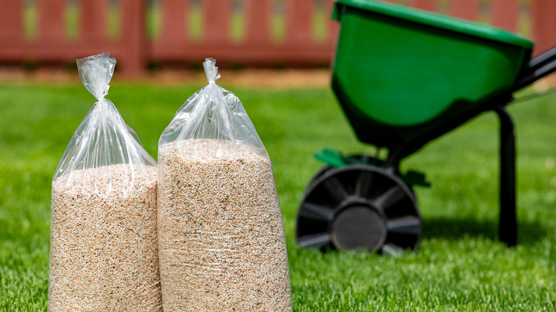 Herbicide granules and spreader