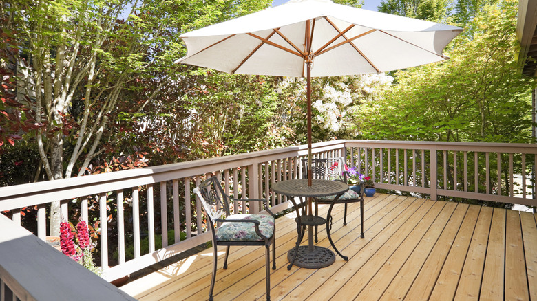 wood outdoor deck with furniture