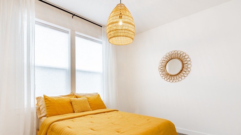 basket pendant light in bedroom