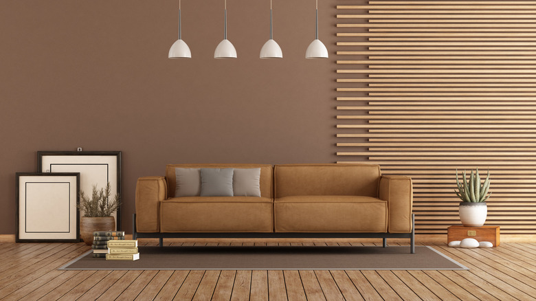 warm brown sofa on a metal frame 