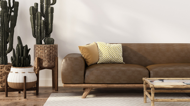couch with wood angled feet