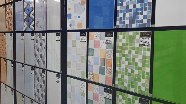 Bathroom tile samples on wall