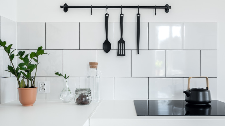 White square kitchen tile backsplash