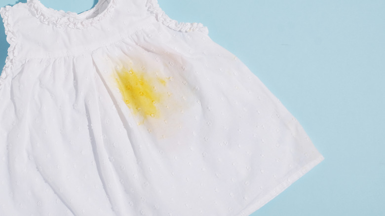 yellow stain white dress