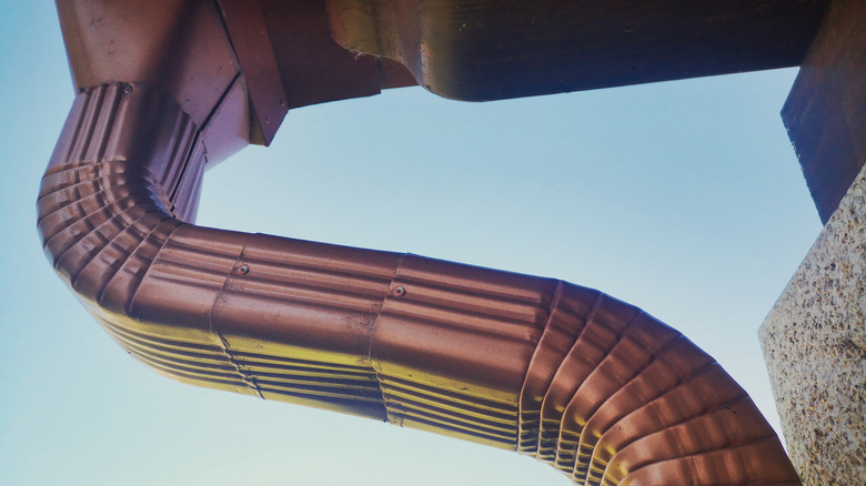 Rain gutter attached to roof