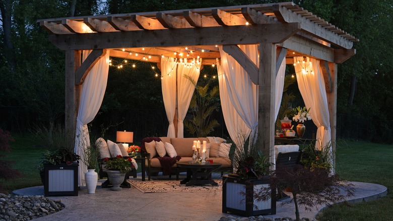 Lit and cozily furnished gazebo