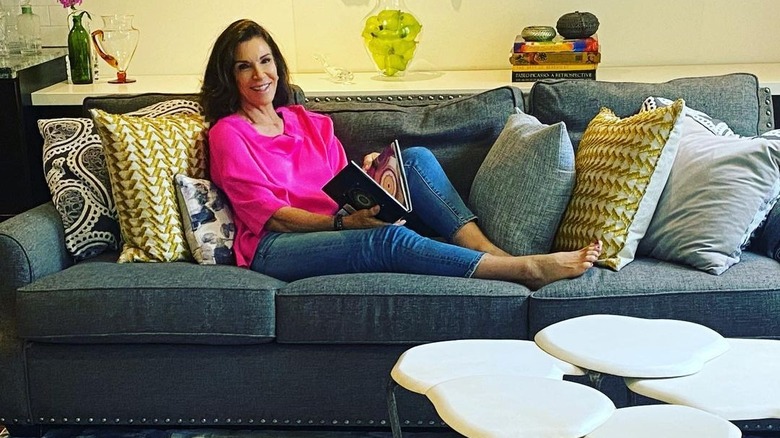 Hilary Farr on couch