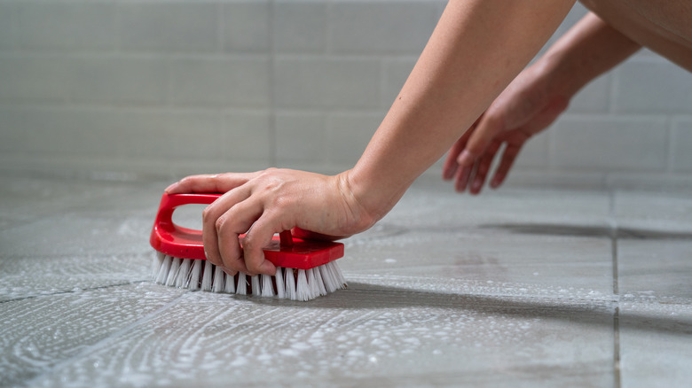 Scrubbing marble tile