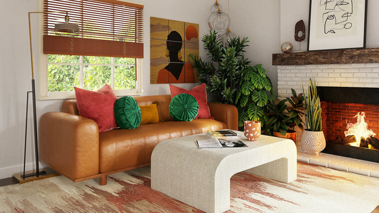 green round pillows on brown sofa