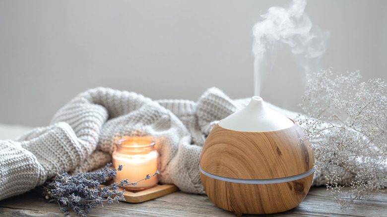 diffuser and candle with dry florals 