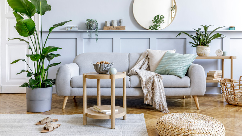 gray sofa and wood accents