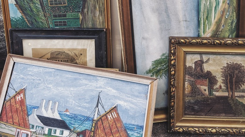 vintage gold paintings in flea market