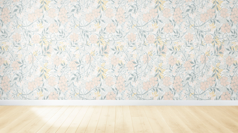 A wall of simple floral wallpaper