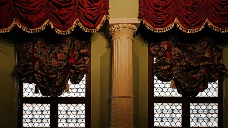 ornately covered formal windows