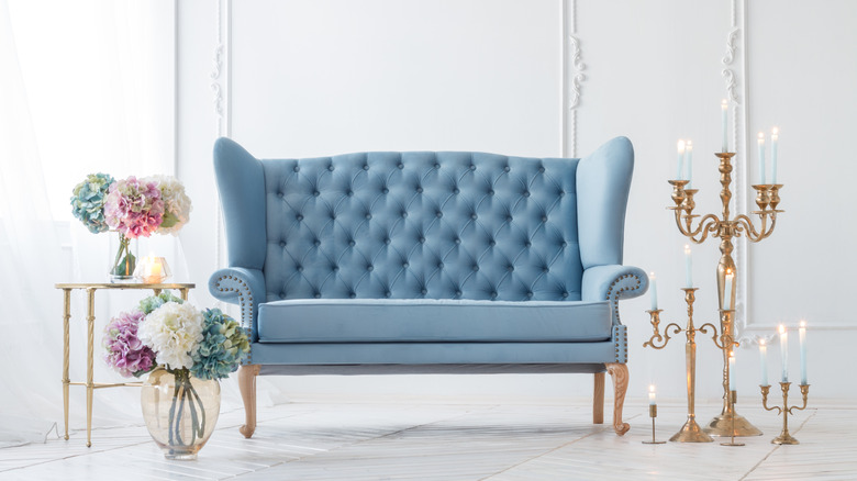 blue tufted antique sofa 