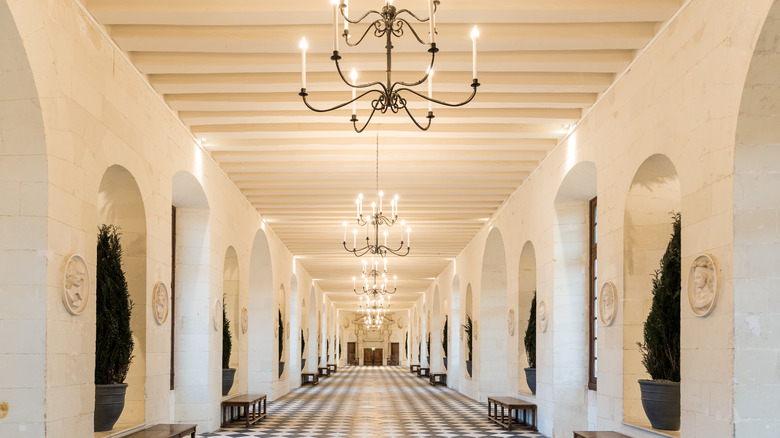 candle chandeliers line hallway