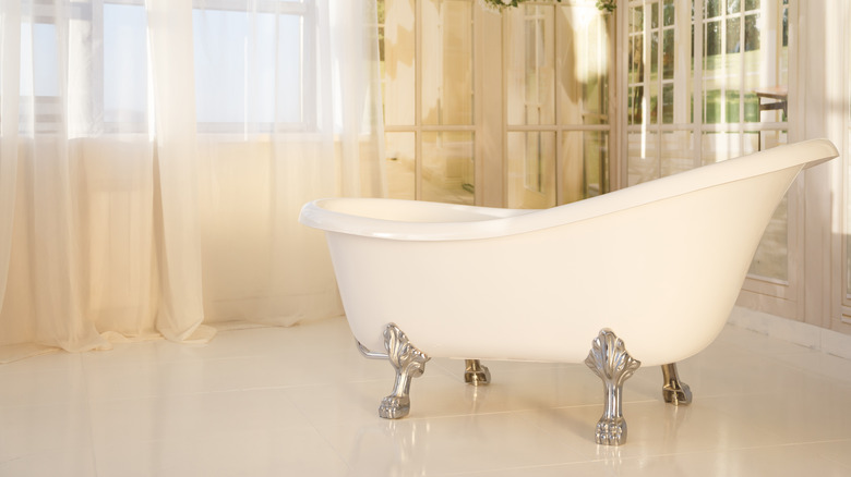 silver claw foot tub in bathroom