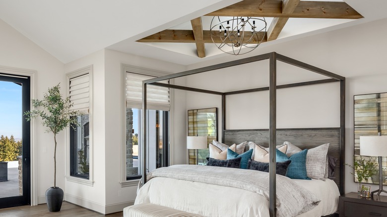 bedroom with  wooden overhead beams