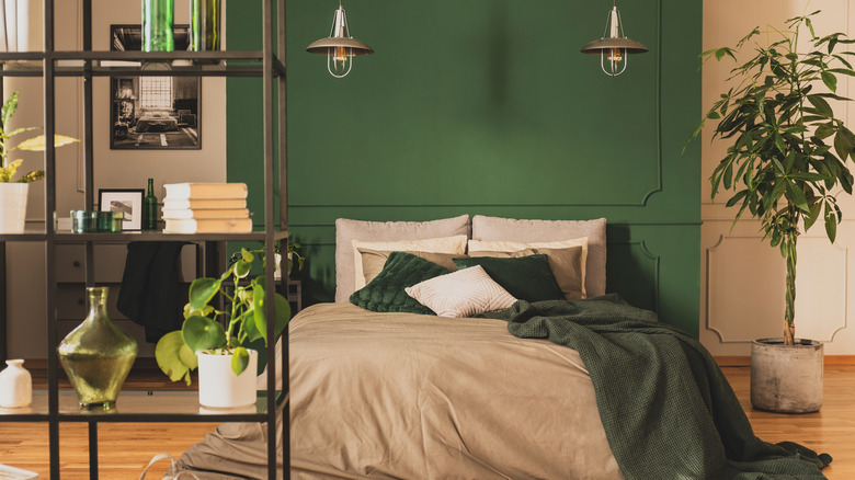 industrial bedroom with green wall