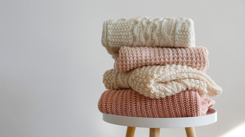 pile of sweaters 