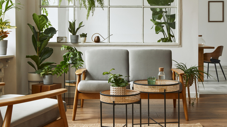 living room arranged asymmetrically with rattan tables