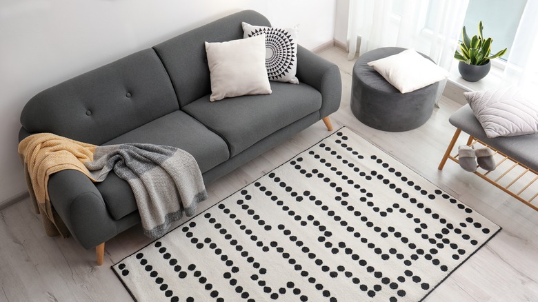 patterned rug next to sofa