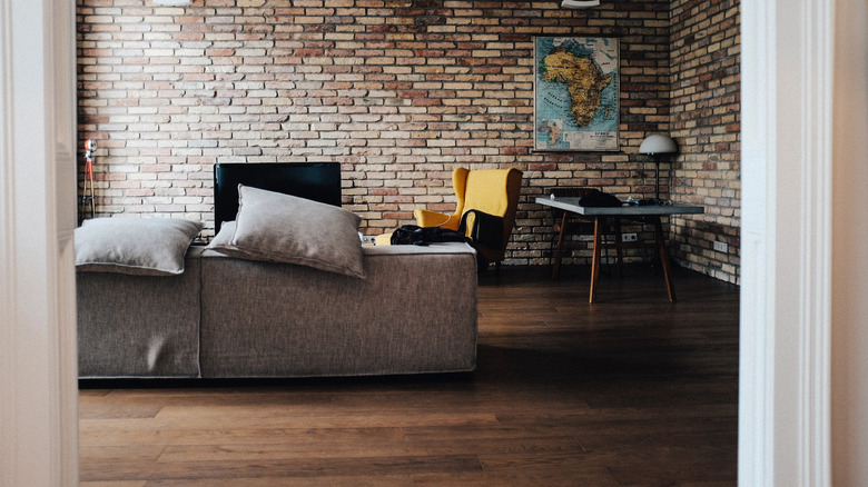 yellow wingback chair and couch