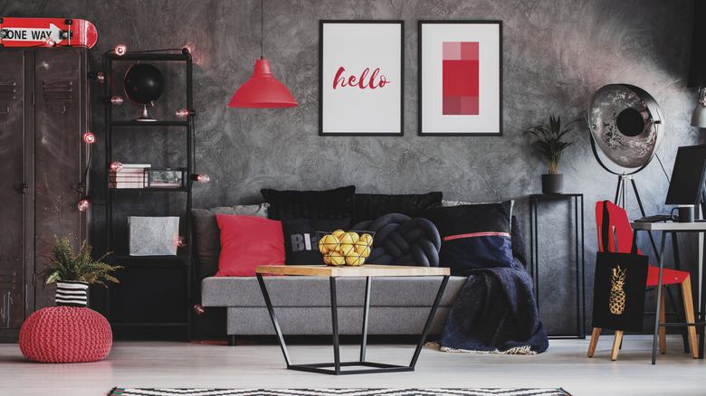 grey living room with red accents 