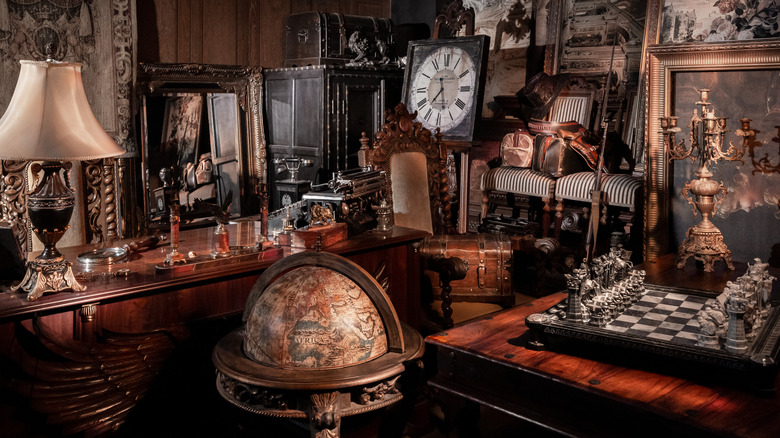 antique paintings and vintage globe 