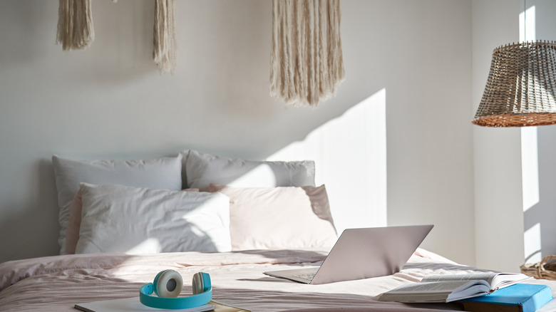 simple white bedroom with sunlight