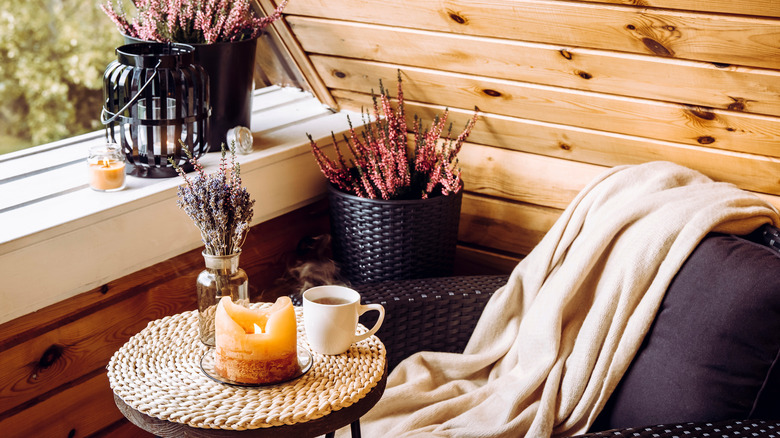 candle and coffee on table