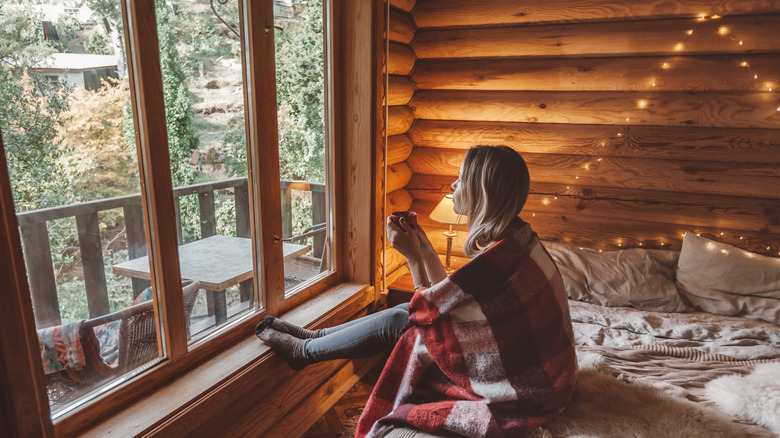 cozy wood bedroom with lights