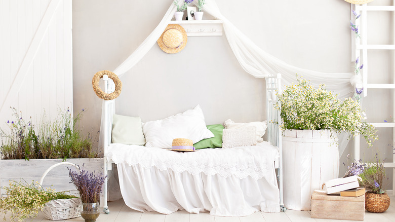 white linen bedding in bedroom