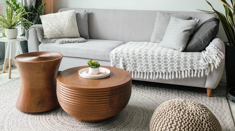 gray couch with coffee table