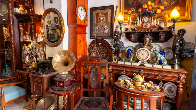 antique clock, paintings, and decorations