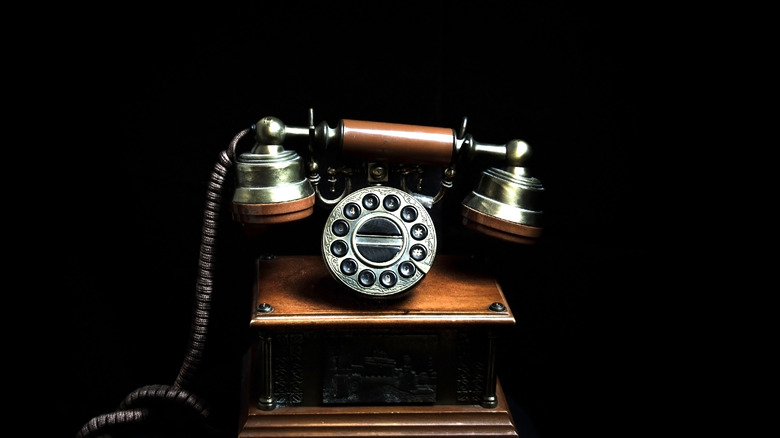 antique dial telephone with cord