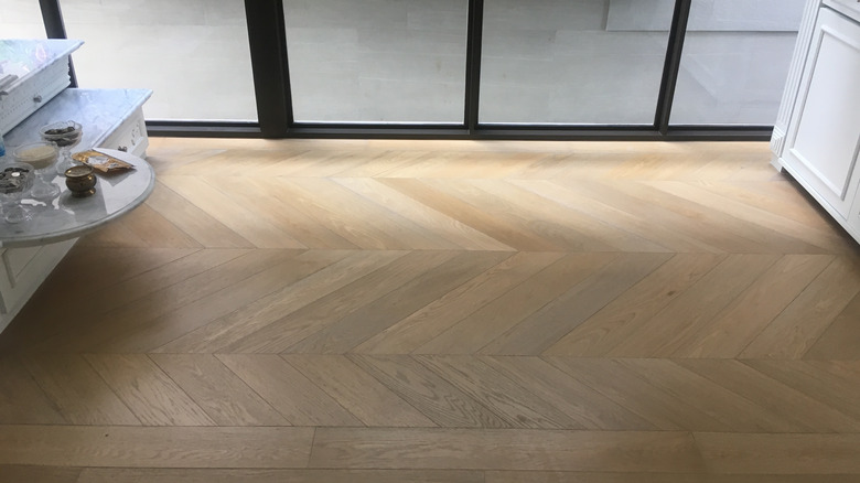 chevron wood flooring in room